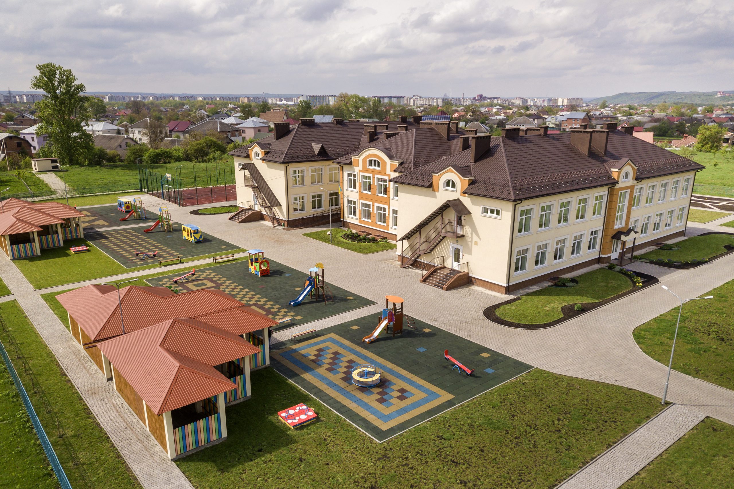 Aerial view of new prescool building in residential rural area.